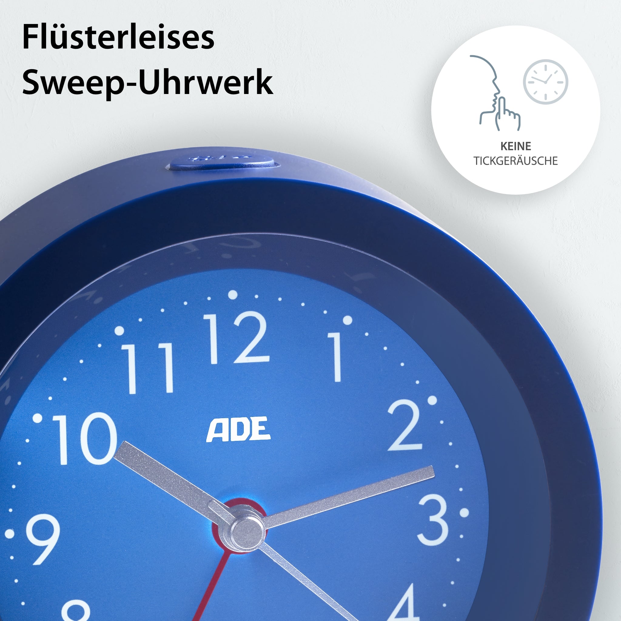 Analog alarm clock with night light sensor