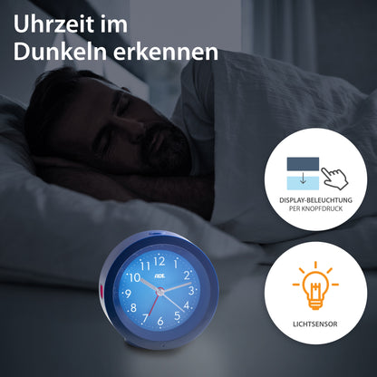 Analog alarm clock with night light sensor