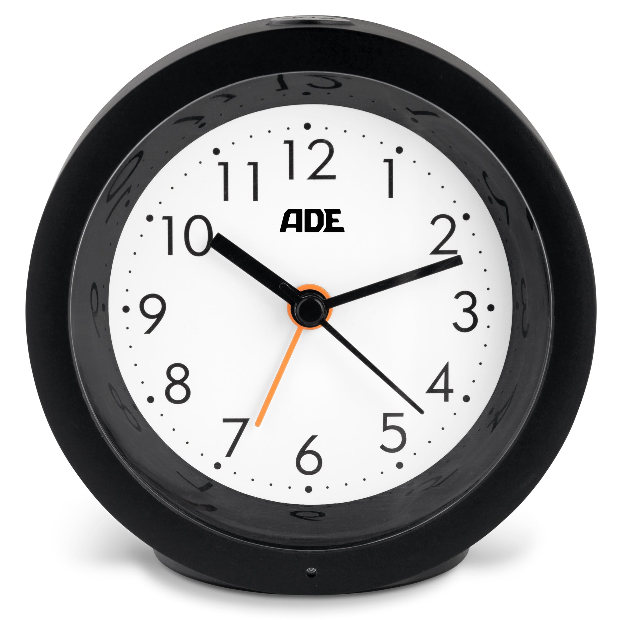Analog alarm clock with night light sensor