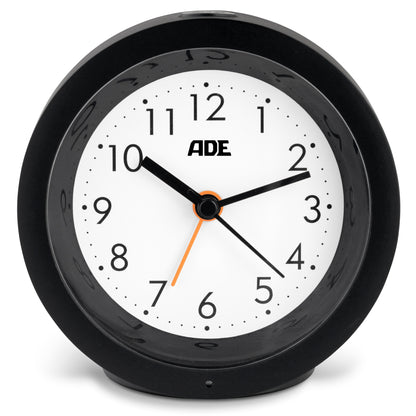 Analog alarm clock with night light sensor