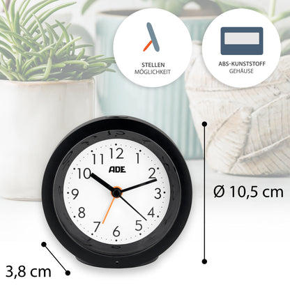 Analog alarm clock with night light sensor