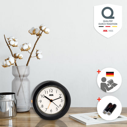 Analog alarm clock with night light sensor